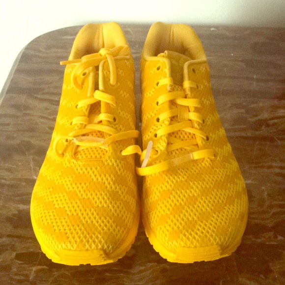 bright yellow adidas shoes